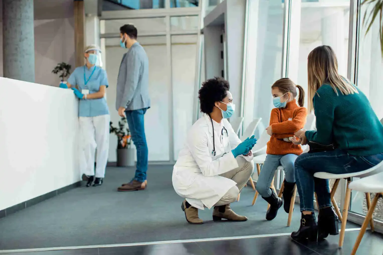 happy family with doctor